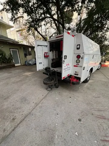 Magnet Plumbing service vehicle on-site for Grease Trap Cleaning in Lake Sarasota